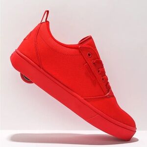 Kids limited Triple red Heelys. New in box.